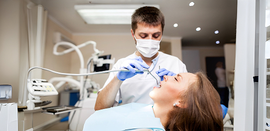 Patient checking veneers result