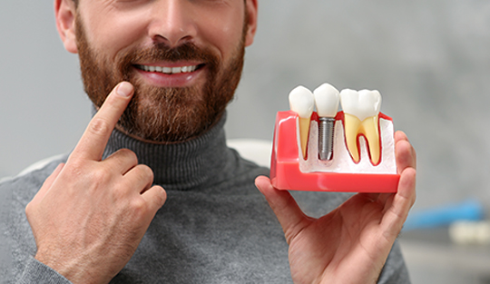 Dentist treating patient